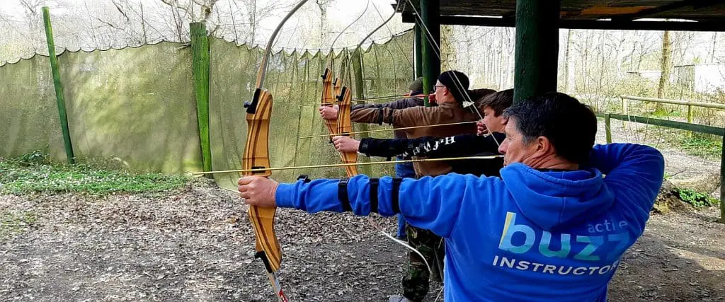 group of students on an archery range