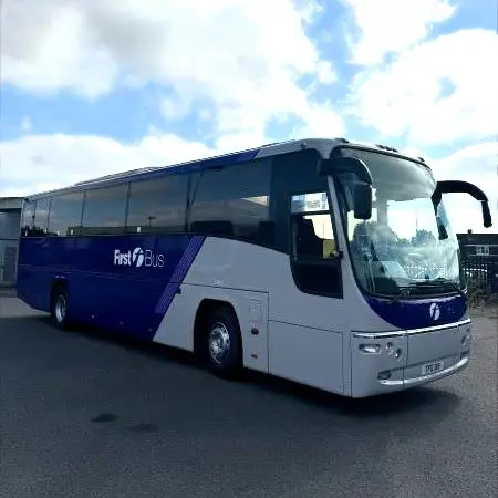 coach in car park