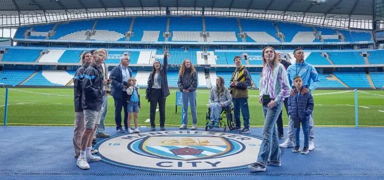 school group at a football stadium