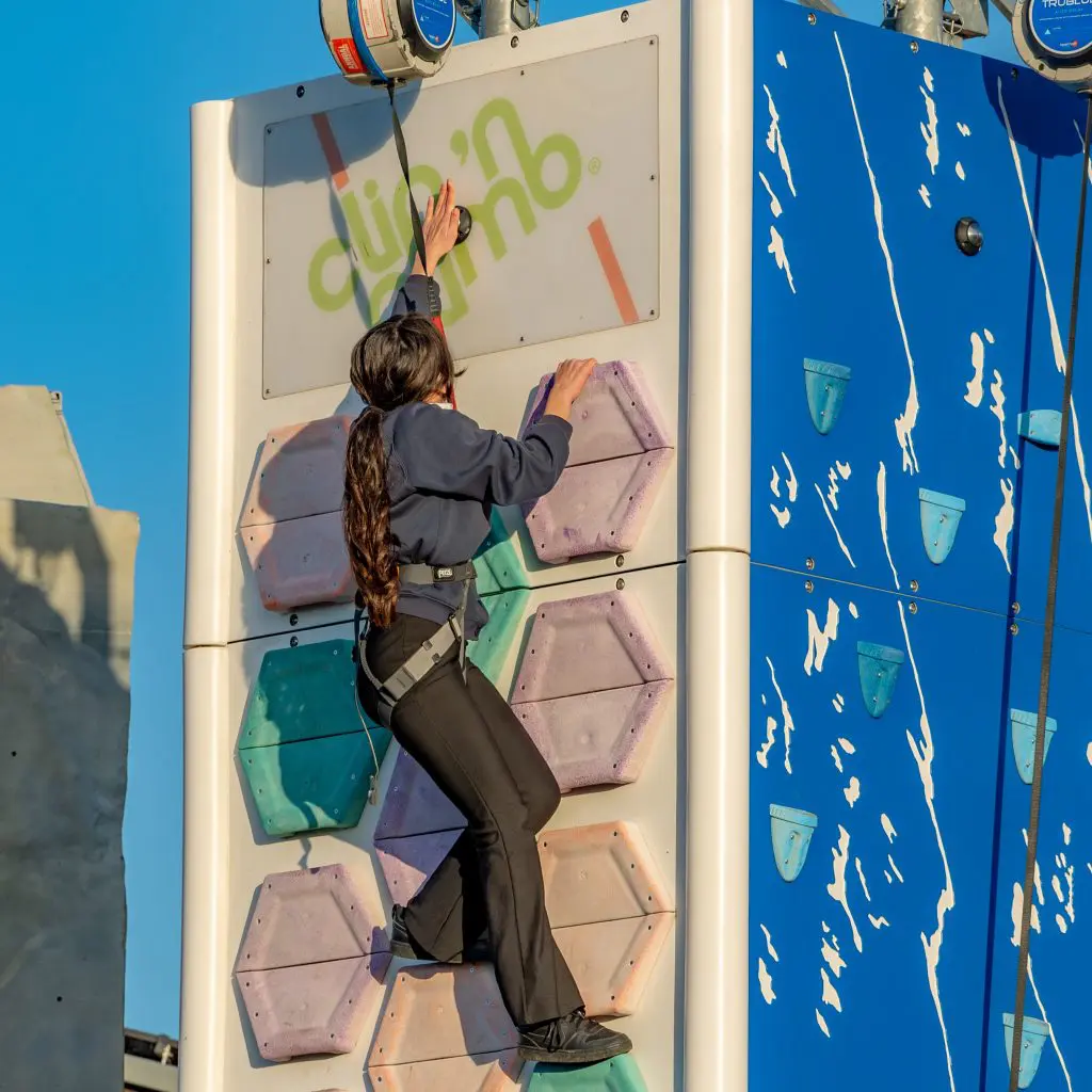 school pupil at ferry meadows activity centre on a climbing wall