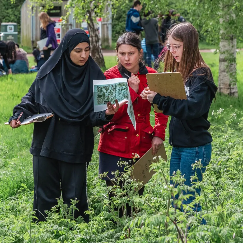 school pupils doing field studies at ferry meadows