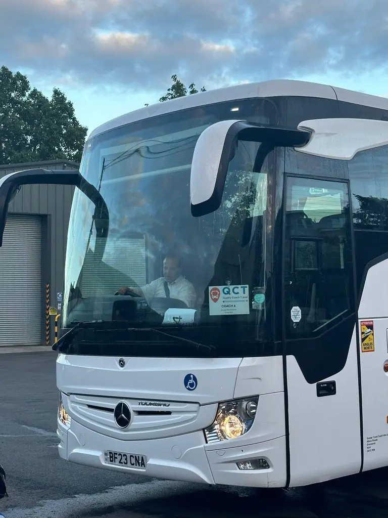 coach with driver on a road