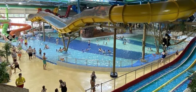indoor water park with log flumes and slides