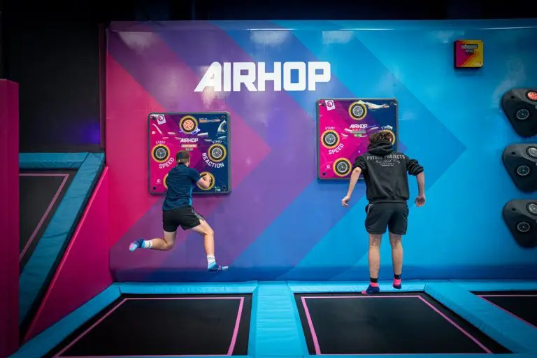 students jumping up and down on on indoor trampolines