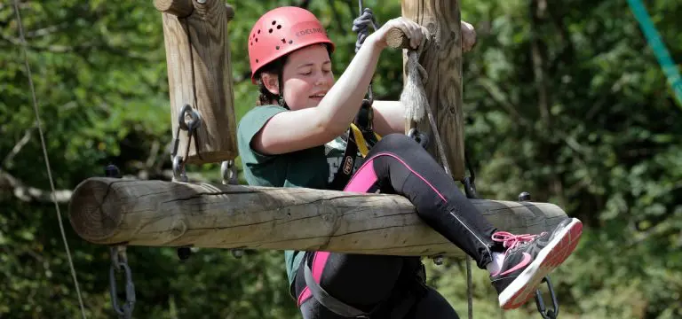 secondary school pupil on a high ropes course