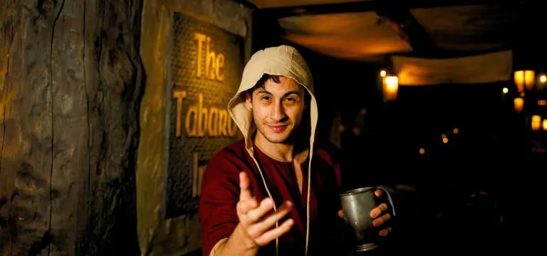 actor dressed up as middle ages peasant man
