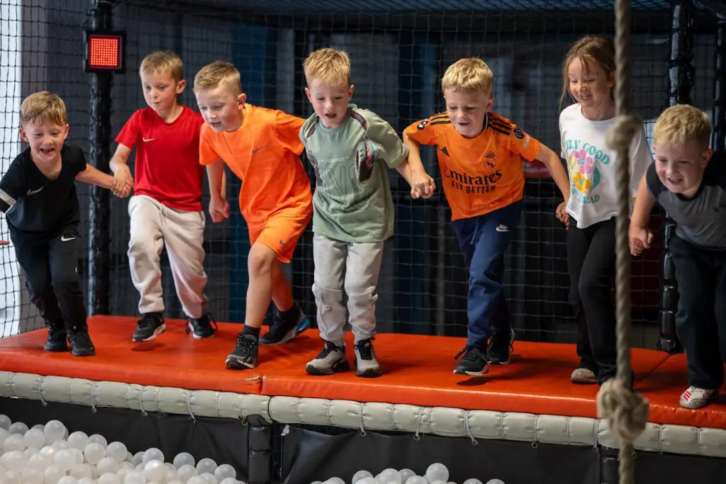 Adventure Parc Activity Centre Snowdonia Wales 3 primary school group jumping into a ball pit