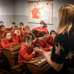 students in a study room learning about history at the National Holocuast centre