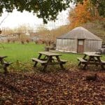 wooden barn in field