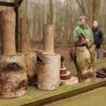 students in woods playing