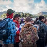 school group at Keswick lake doing orienteering