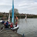 small two person sail boat on lake