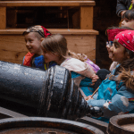 pupils on the cannon deck of the golden hinde
