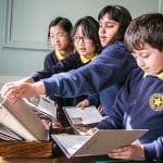 school pupils reading books