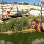 pupils on a zip wire activity at bluewater Kent