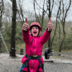 pupil in a woodland setting doing bushcraft