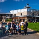 group of primary school students having a photo taken at Mount Cook residential centre