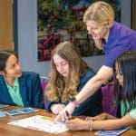 school students in a study classroom learning about theme park engineering