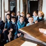 school group listening to a presentation about Shakespeare