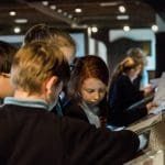 school pupils drawing William Shakespeare in a study room at the museum