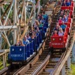 two wooden style mini roller coaster rides for primary school children