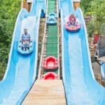 pupils in boats on a water log flume ride