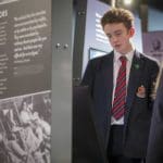 pupil reading interactive exhibit at museum