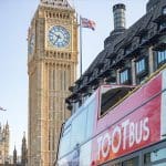 London bus by houses of parliament