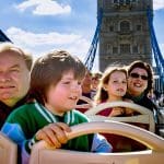 school group in London on an open top bus