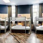multiple bunkbeds in sleeping room