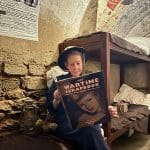 museum guide dressed up as WW2 air raid inspector