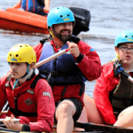 pupils and instructor on a sailing boat