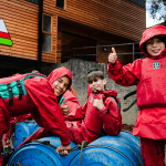 school group with water proof clothing on