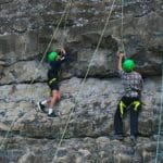 pupils doing rock climbing