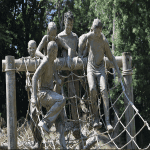 school group covered in mud on an assault course in Dorset