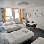 dorm room with 4 beds for school pupils