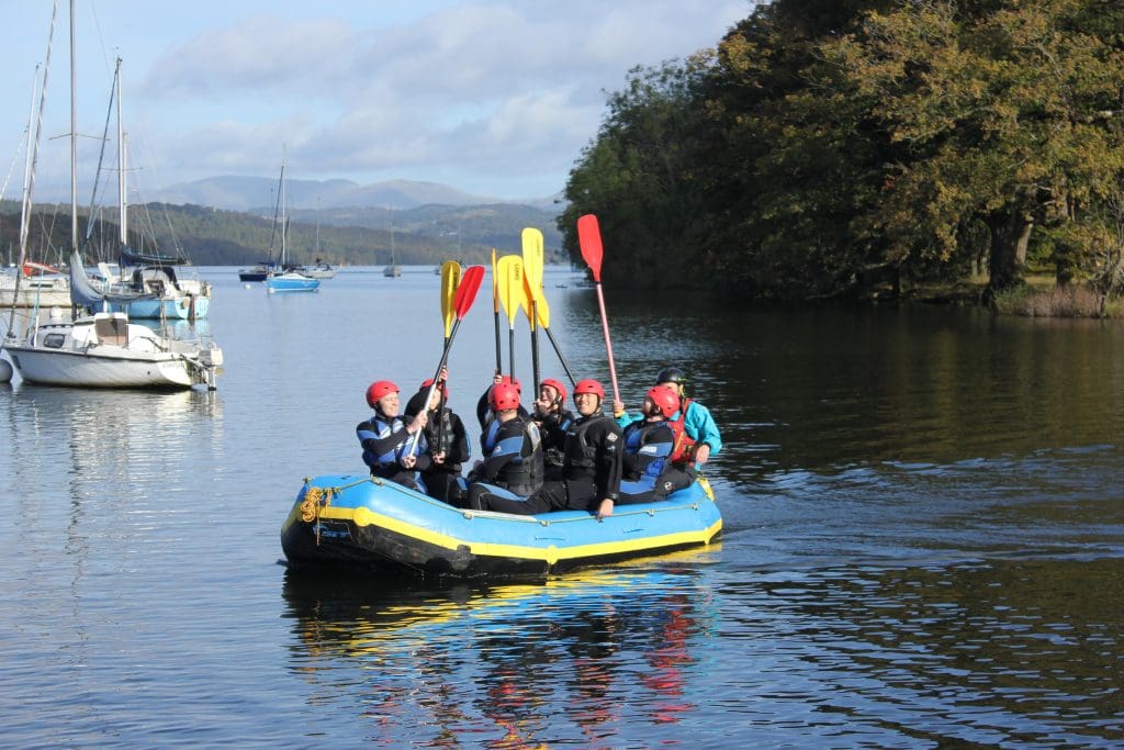 secondary group in a dingy on a river