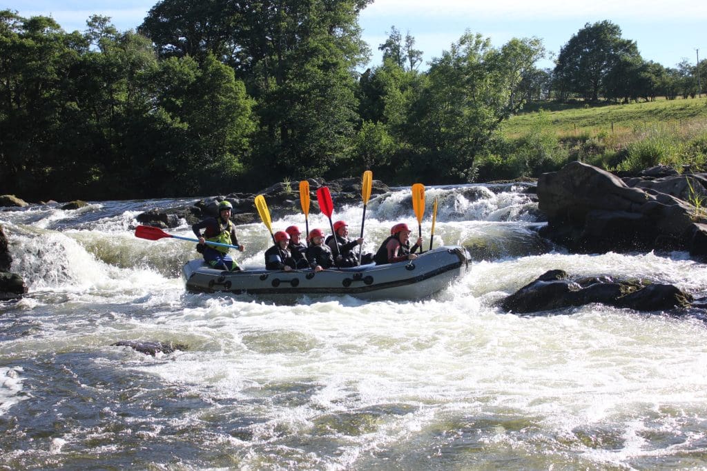 white water rapids of a fast flowing river in Lake district