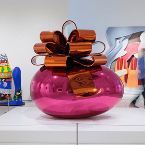 large exhibition gallery area with pink decorative egg