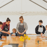 indoor food making area with primary school children baking