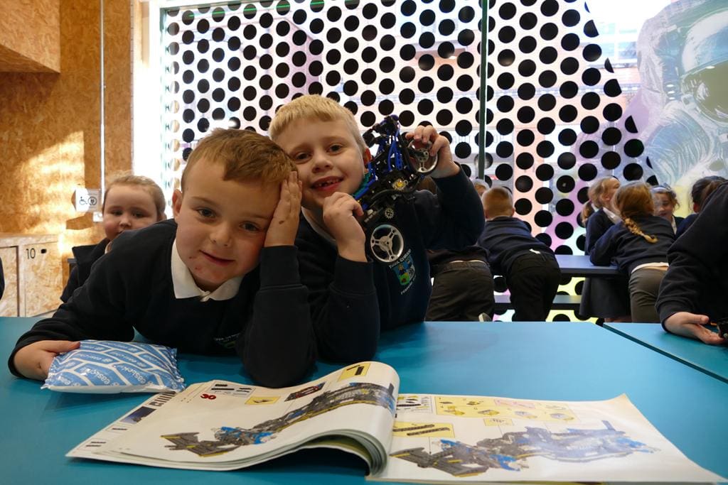 pupils building a science instrument