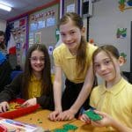 school pupils at the Xplore science Discovery Centre making an engineering object