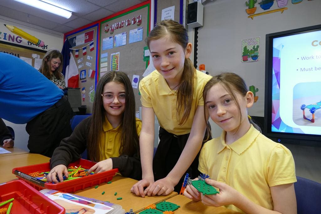 school pupils at the Xplore science Discovery Centre making an engineering object