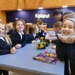 school pupils solving science puzzle at Xplore Science in Wales