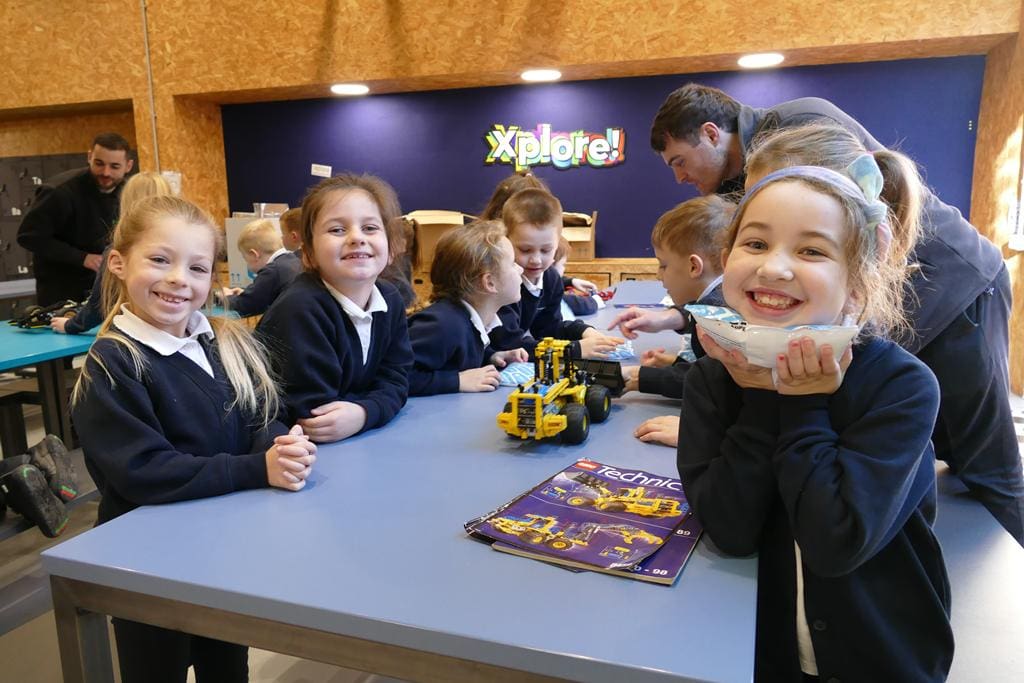 school pupils solving science puzzle at Xplore Science in Wales