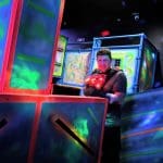 student with laser tag equipment on