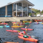 image of students doing water sports in kayaks at Herts young mariners in Hertfordshire