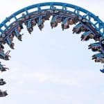 students on a roller caoster at Pleasurewood Hills theme park