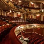 internal seating area of the Apollo Theatre London