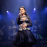 actress on stage at vaudeville theatre dressed as princess